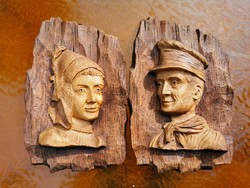 Antique female and male portrait, carved wall decoration