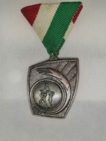 Old sports medal with chest strap