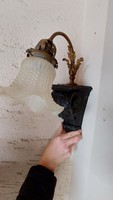 Antique wall lamp in the corner