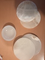 Four small onyx plates and a bowl