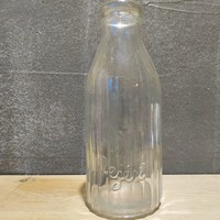 Half a liter bottle of milk labeled milk