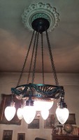 Antique chandelier in copper alloy with twisted glass covers