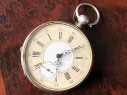 Men's pocket watch with silver key