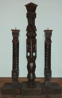 Single wood carved, pierced three-pronged candlestick