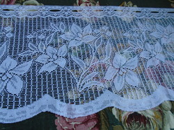 Új, virágmintás vitrázsfüggöny. 165 x 30 cm.