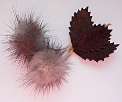 Large brooch with leather and rabbit fur