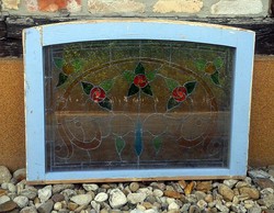 Window frame with colored glass pattern, vintage