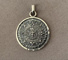 Sterling silver Mexican Aztec calendar pendant from the 1960s