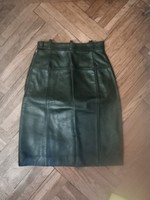 A small black leather skirt from the 1970s in good condition
