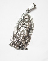 Virgin Mary silver pendant, Mexico.