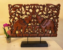 About one forint - a beautiful, elephant, wood-carved ornament