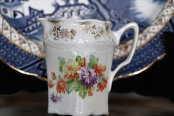Antique milky jug with cream