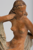 Careful ceramic sculpture of Joseph with terracotta nude drapery