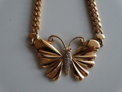 Aranyozott nyaklánc, nyakék pillangó középpel, apró kristályokkal