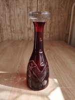 Burgundy lips with crystal liqueur bottle and polished decoration