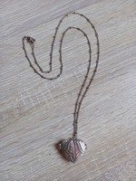 Heart shaped photo pendant with long chain