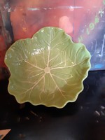 Cabbage leaves in porcelain bowl