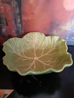 Cabbage leaves in porcelain bowl