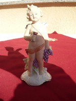 Egy kis porcelán szobor,, angyalka,,Bacchus segédje...Fasold  Staud,, 16 cm..