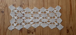Delicate lace needlework, under porcelain 30 x 14 cm.