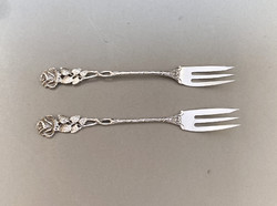 Silver cake forks in Hildesheim with roses.