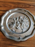 Wall plate made of tin