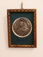 Mary in an old wooden frame