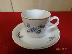 Ravenhouse coffee cup + placemat with blue floral pattern. He has! Jókai.