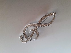 Beautiful condition treble clef decorated with shiny polished white glass stones