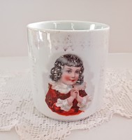 Old kid's mug with little girl