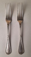 2 silver forks with diana mark