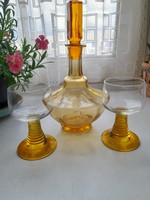 Art deco glass bottle with two rumble glasses, amber color