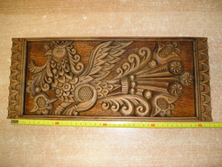 Carved wooden wall decoration 42 x 17.5 x 3 cm.