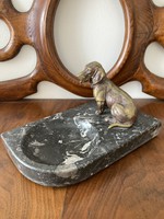Table decoration - dachshund dog on granite pedestal