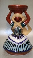 Glazed ceramic woman figurine with candlestick