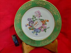 Porcelain plate with French limoges floral pattern.