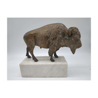 Bronze bison on a marble pedestal - m01058