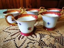 Set of 6 German porcelain coffees with gold border and baroque handles. 500 HUF / pc