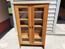 Narrow pine cabinet with ikeas vitrines for sale.