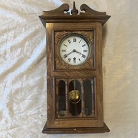 Antique wall clock in beautiful condition