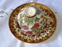 Museum fauna-headed Zolnay teacup with family seal