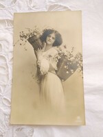 Antique postcard / photo sheet of young lady with flower basket 1912