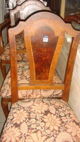 High back two civilian chairs in good condition.