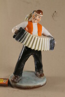 Glazed ceramic accordion boy 635