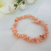Coral bracelet, a stone of abundance.