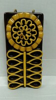 Retro, vintage marked relief, ceramic mural, wall decoration, brown base with yellow flower, white l. Signaling