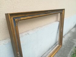 Beautiful elegant wooden picture frame. Nest: 80x60 cm. Color: gold, antique.