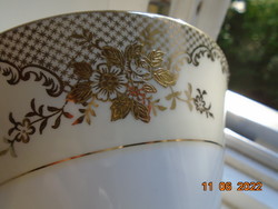 Bowl of Noritake luxury Japanese porcelain gold brocade with floral lattice pattern