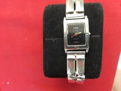 Retro elegant silver women's watch with clock.