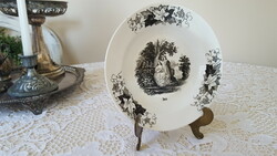 Antique decorative plate for the month of July